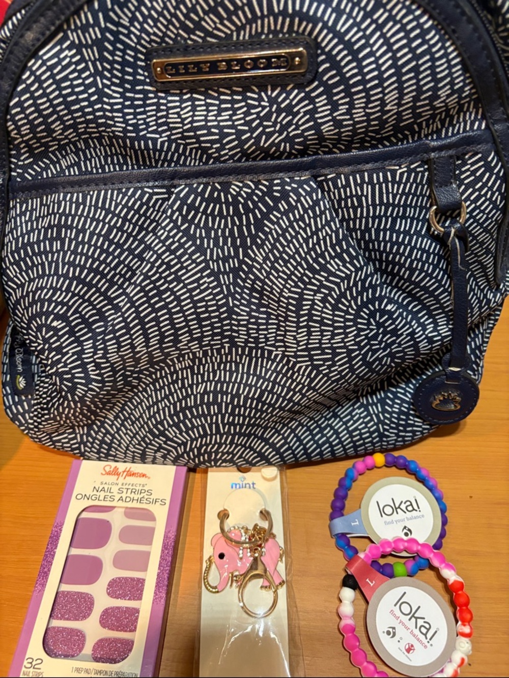 Lily Bloom Navy and White  Patterned Backpack with Charm